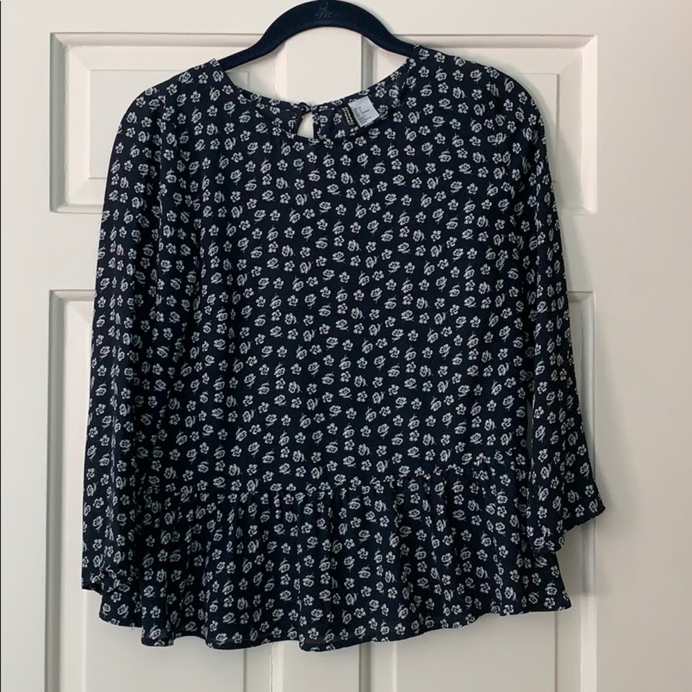 Navy blue and white floral peplum top